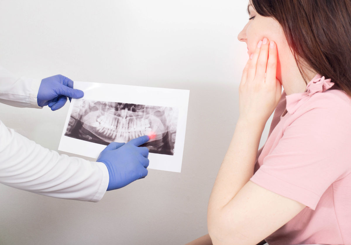 Nécrose Dentaire : Causes, Symptômes et Traitements